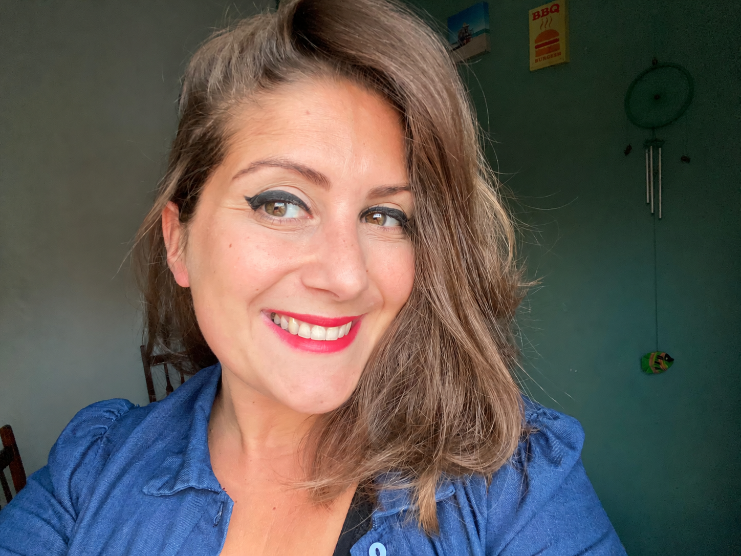 Anna Maria Onorati smiling in a blue shirt